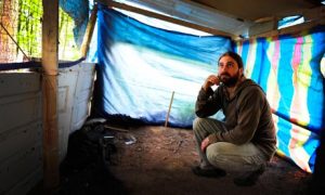 Phil Inkley in an abandoned den in Hampshire